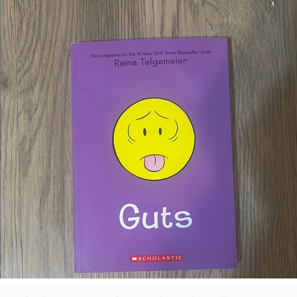 Scholastic Guts Book with Purple and Yellow Cover